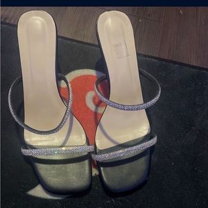 Women’s black with sparkles high heals size 9.5